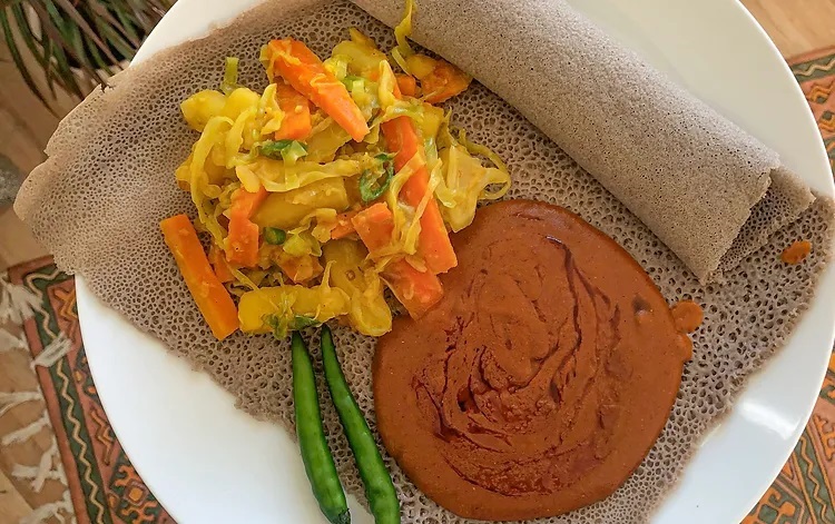 Ethiopian "Tikil Gomen  with injera"